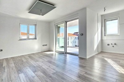 Poreč - new apartment of 53 m2 with a garden near the city, 2 parking spaces 1
