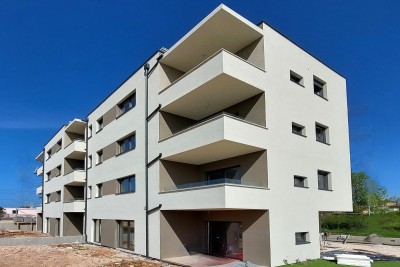 Poreč - stan u izgradnji od 62 m2, 1. kat, 2 parkinga, zgrada ima LIFT 1