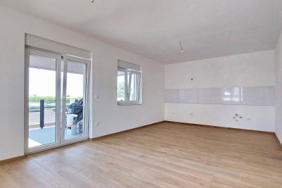 Novi stan površine 72 m2 u okolici Poreča s vrtom površine 170 m2 1